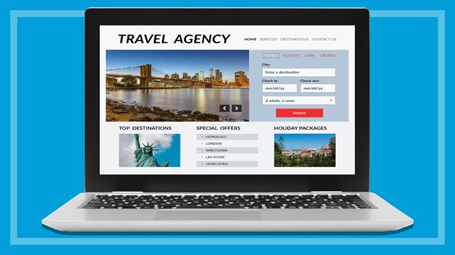 laptop with travel agency website on screen