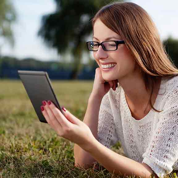 woman in field reads ebook square