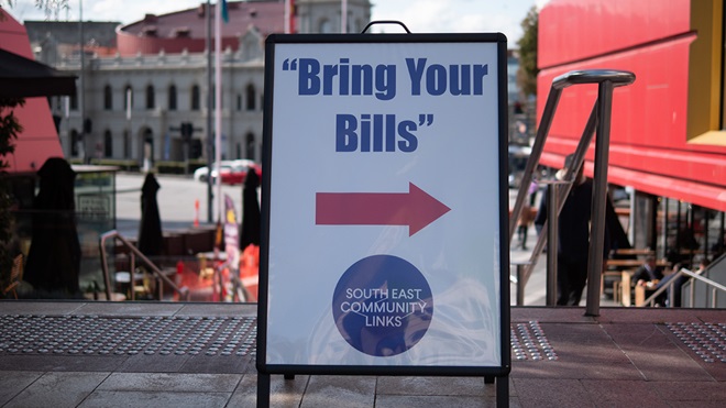 bring your bills sign with arrow