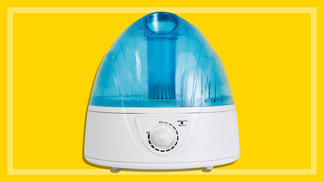 Blue and white humidifier on yellow background