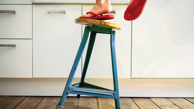 lead kitchen safety woman falling off stool