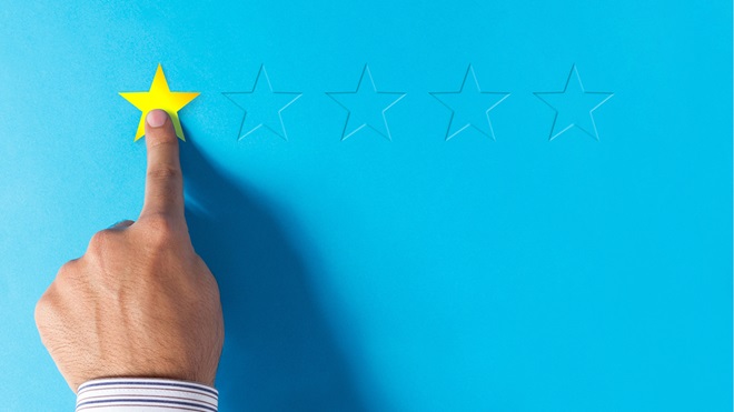 person selecting a one star rating