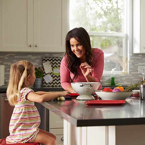 two women in kitchen with daughter landing sq