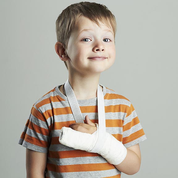 boy with hand in sling