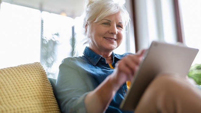 woman_looking_at_retirement_bonus_online