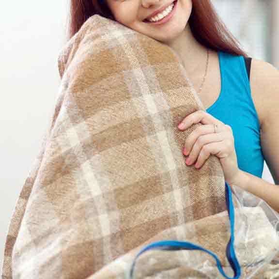 electric blanket and woman square