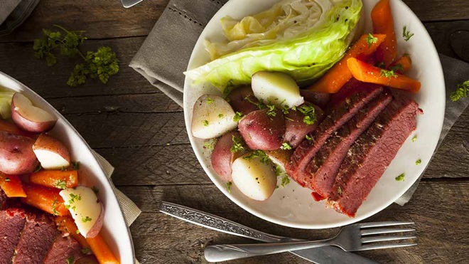 slow cooked corned beef on plate with veggies recipe lead