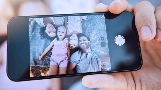 family taking selfie photo