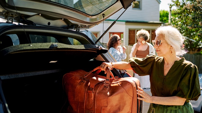 woman_loading_luggage_into_car