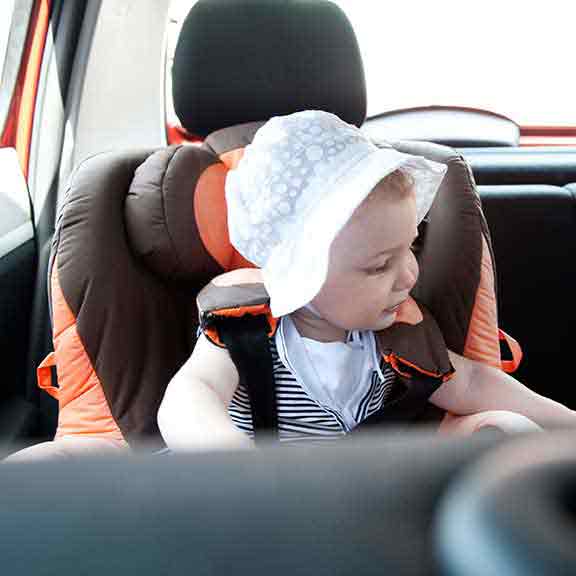 baby girl in car seat